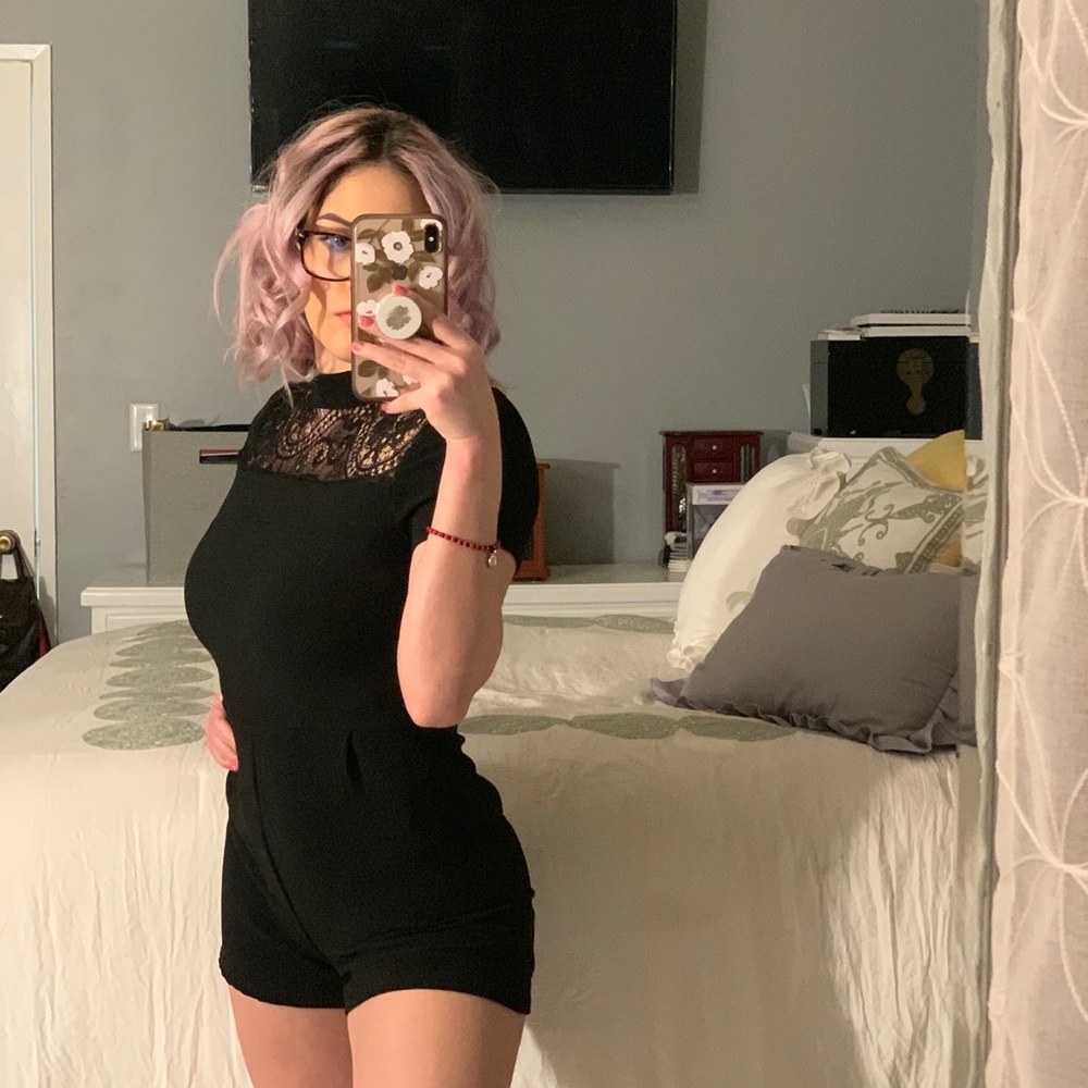 Woman’s black romper open back